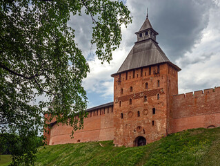 Fototapeta na wymiar Fortress wall and towers. Kremlin in the city of Novgorod, Russia 