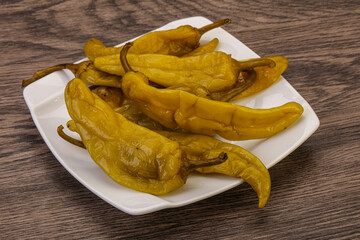 Marinated spicy and hot green pepper