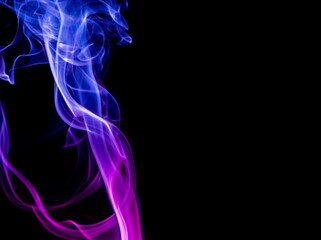 Obraz premium Colored smoke on black background