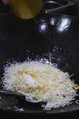 White rice in wok pan, fried rice, cooking