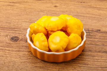 Marinated patissons in the bowl