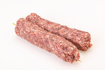 Raw minced beef kebab skewer