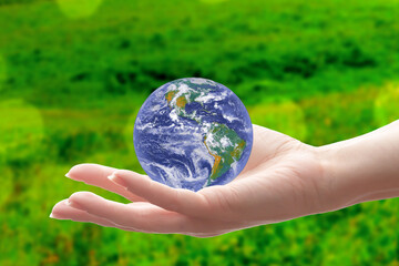 Global environmental protection, icon of the earth and the world in the hands of man, green planet, symbol of ecology, renewable resources, concern for nature, Element of the image provided by NASA