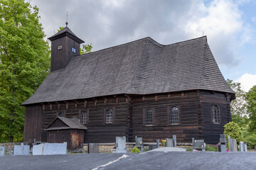 Fototapeta na wymiar Wooden church of St. Martin from 1611 in Zalova near Velke Losiny, Northen Moravia, Czech Republic