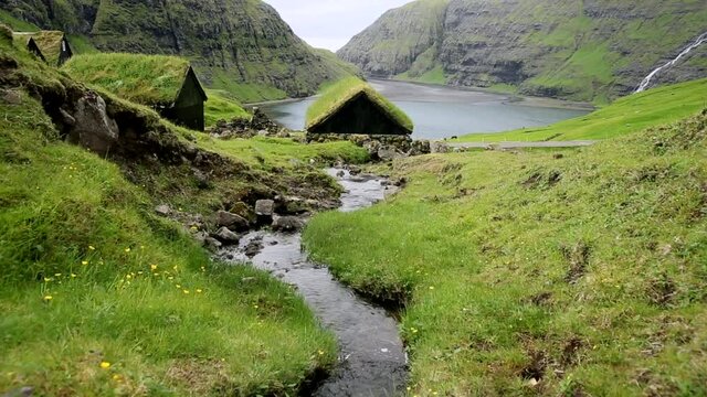Faroe Islands, denmark archipelago. Saksun village, river and lake.