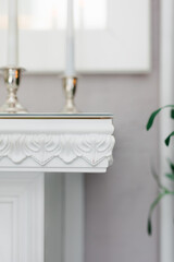 plaster pattern on the fireplace. close-up