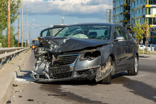 broken car in the street