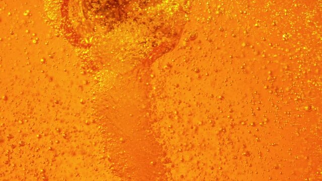 Super Slow Motion Shot of Beer Fizzy Background at 1000 fps.