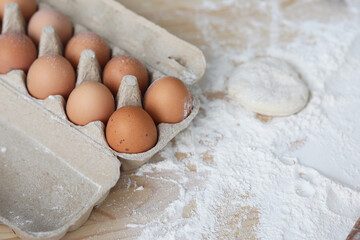 Fototapeta na wymiar packing eggs and flour on the table