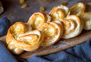 Homemade Palmier Puff Pastry. Delicious french palmier cookies with sugar. Palmiers, elephant ear, puff pastry cookie