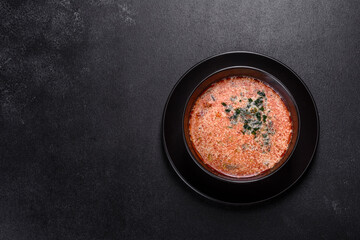 Tasty fresh spicy Malaysia soup tom yam with tomato