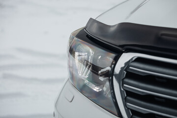 The headlight of modern luxury SUV car