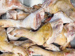 The Piled frozen pork legs waiting for sell in department store