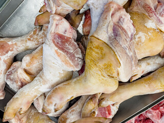 The Piled frozen pork legs waiting for sell in department store