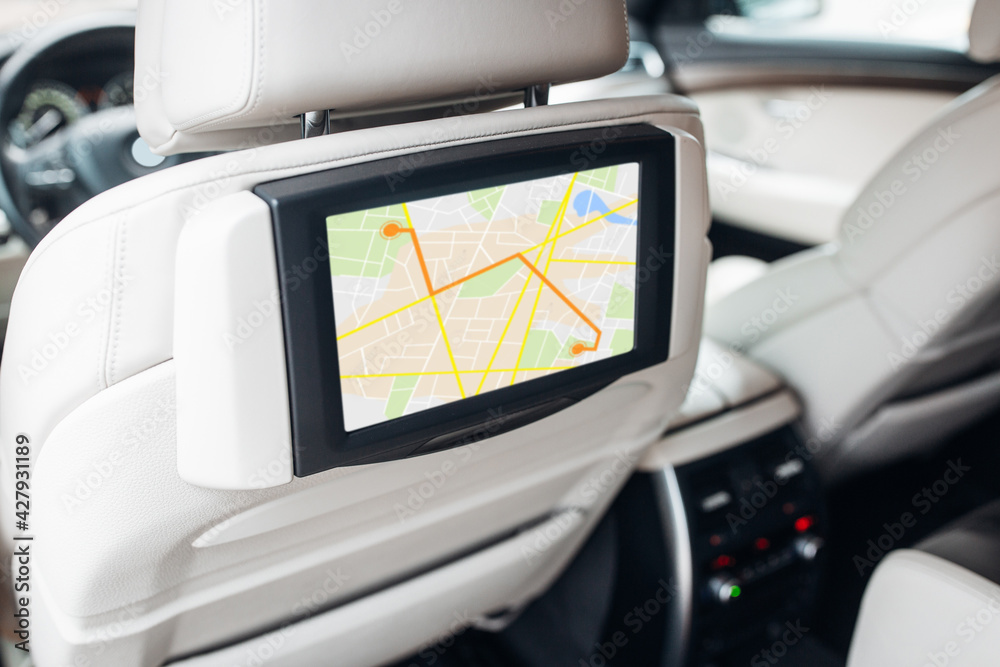 Poster modern car multimedia control system with navigation map mode at the headrest of the seat