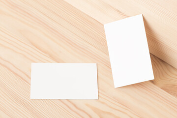 Obraz na płótnie Canvas Blank business card template 85x55mm on natural wood texture background. 