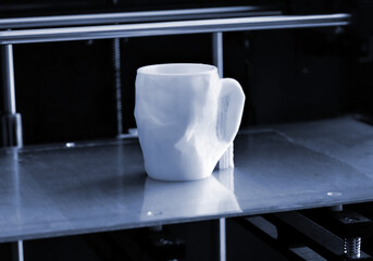 Objects printed by 3d printer. Automatic three dimensional 3d printer performs