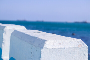 The sea from behind the stone fence