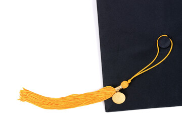 gold tassel and graduation cap