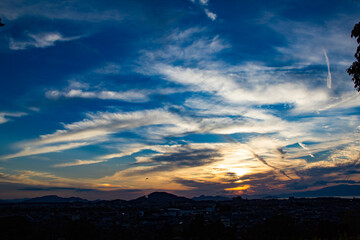 sunset sky streaked with clouds