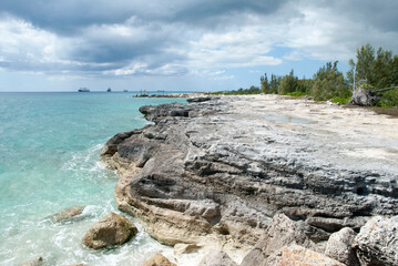 Fototapeta na wymiar Grand Bahama Island Coastline Under Rainy Sky