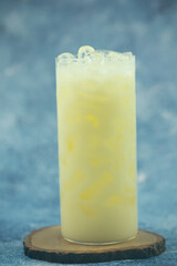 A glass of milk curd with ice