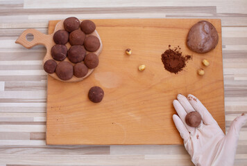 Making of craft chocolate candies. Selective focus.