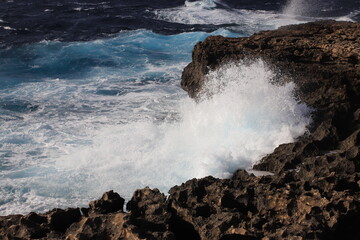 Huge waves crashing on the rocks of Gozo Island, Malta