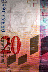Obraz premium Macro detail of security features in reverse side of a twenty Swiss franc banknote featuring a watermark portrait of composer Arthur Honegger