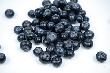 Group of fresh ripe blueberries on white background