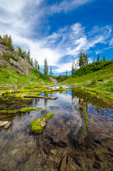 Fototapeta premium Majestic mountain lake in Bagley Lake Park, Mount Baker, Washington, USA.