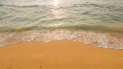 Beautiful beach and tropical sea. Sand and water vacation background.