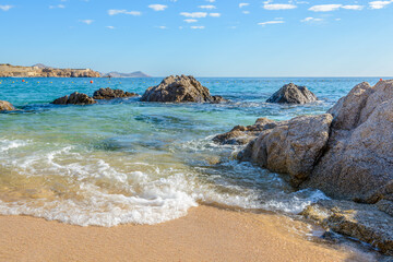 Playa el Chileno Beach, Cabo San Lucas, Mexico. Different stages of the fantastic ocean waves. Rocky and sandy beach.