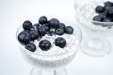 Healthy breakfast with yogurt, chia seeds and blueberry. Vegan food
