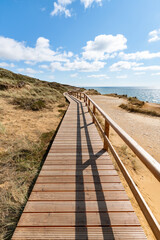Wooden boardwalk along the Rotes Kliff (red cliff), Sylt, Schleswig-Holstein, Germany