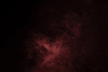 Yellow and pink steam on a black background.