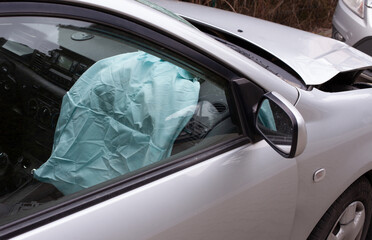 Car after the accident with a safety airbag deployed