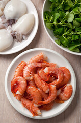 Raw shrimp and cuttlefish. High quality photo.