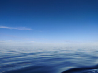 Fototapeta na wymiar Lake Ladoga. Windless weather. Small ripples on the water.