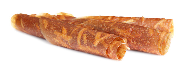 Delicious fruit leather rolls on white background
