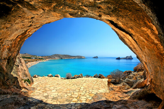 "Through" the cave you can see one of the many beautiful beaches at Xerokambos, Sitia, Lasithi, Crete, Greece.