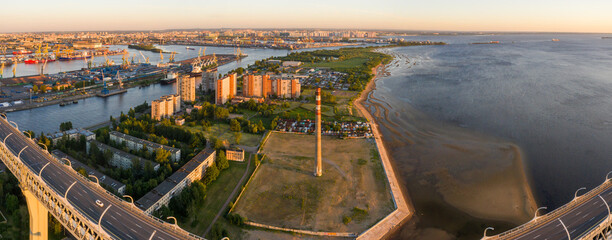 Aerial view of cargo ship, cargo container in warehouse harbor in the Morskie Vorota district in St. Petersburg © miklyxa