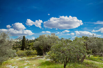Obraz premium Athens, Greece, Acropolis hill, blue cloudy sky background
