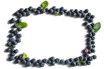 Blueberry isolated on a white background. Healthy food, raw food diet. Frame made of berries. Place for text.