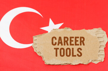 Against the background of the flag of Turkey lies cardboard with the inscription - Career Tools