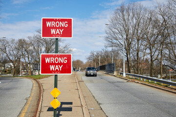 Wrong way sign on the road © isaac