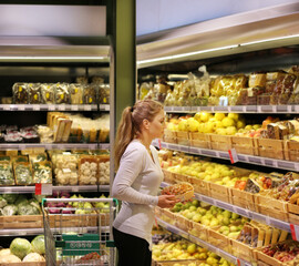 Woman buying fruits at the market