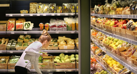 Woman buying fruits at the market