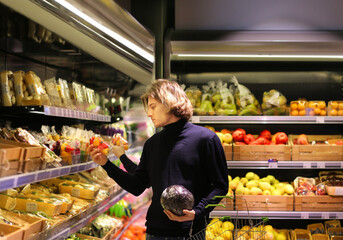 Man buying fruits at the market