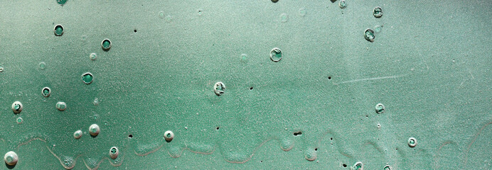 green grunge painted wall background 